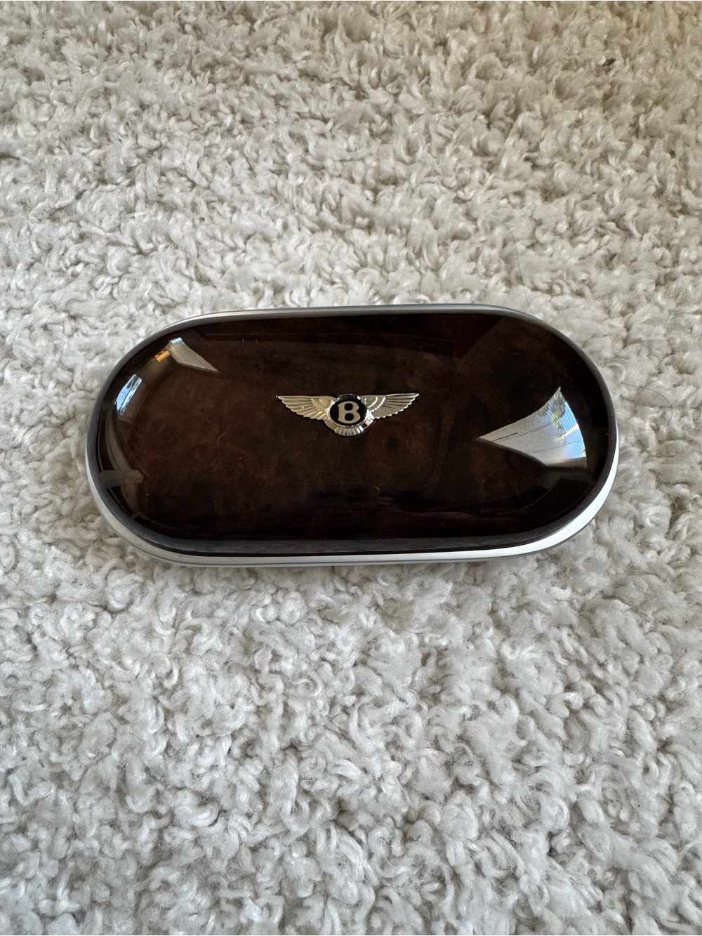 Bentley OEM sunglasses case, featuring a dark burlwood finish